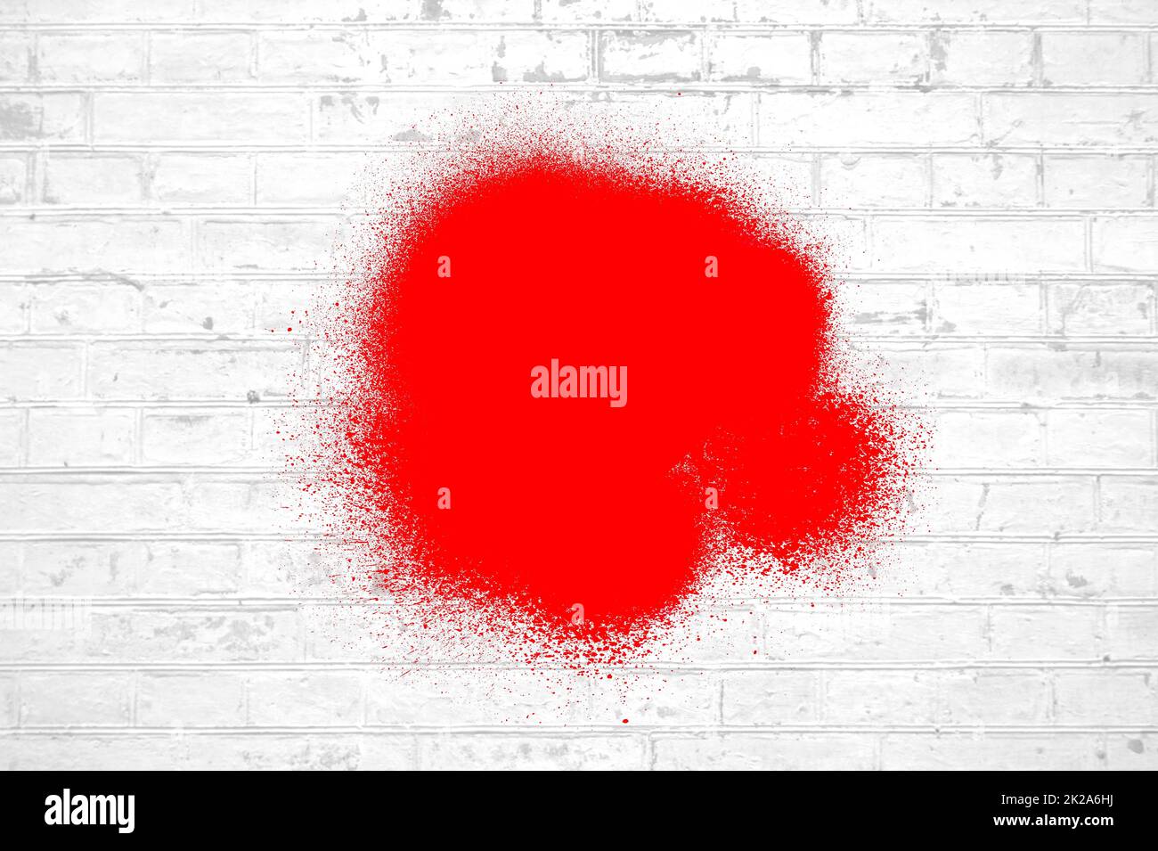 Graffiti Background - White brick wall with red spray Stock Photo - Alamy