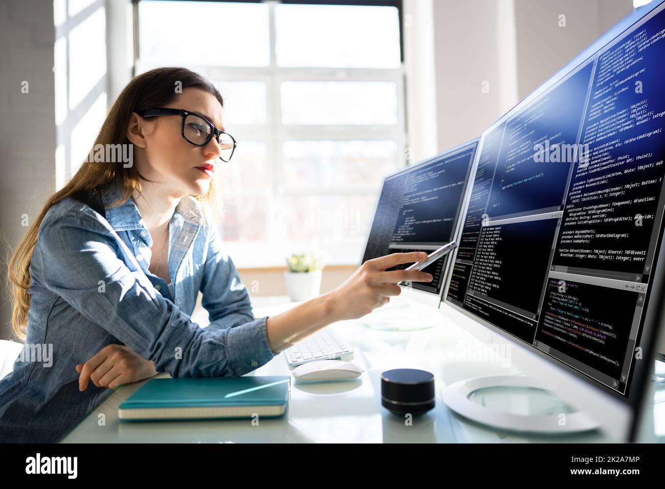 Woman Programmer. Girl Coding Stock Photo - Alamy