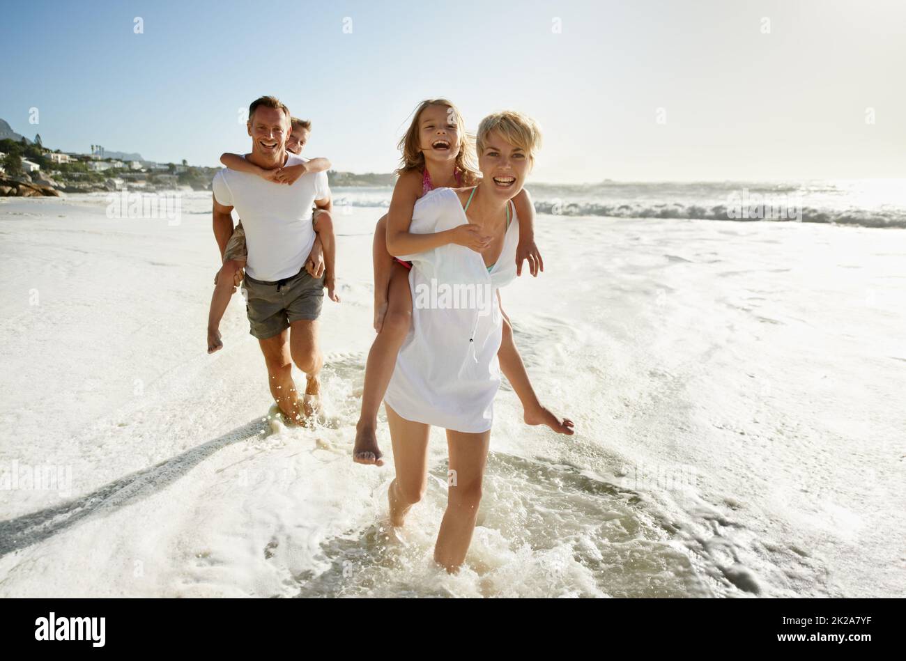 Family beach fun. A family having fun at the beach. Stock Photo