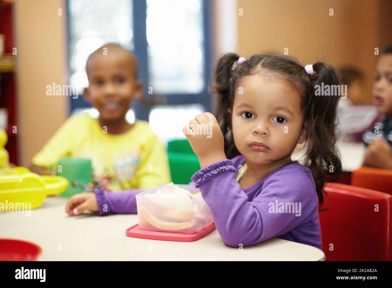 Getting some energy for the fun activites ahead. Preschool children on