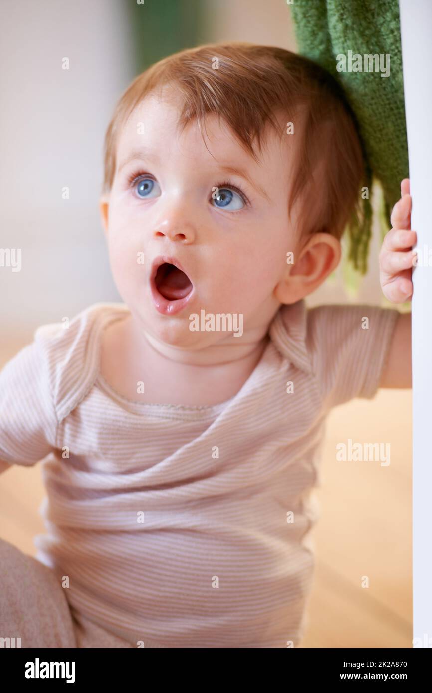Shocked. An adorable little baby looking surprised. Stock Photo