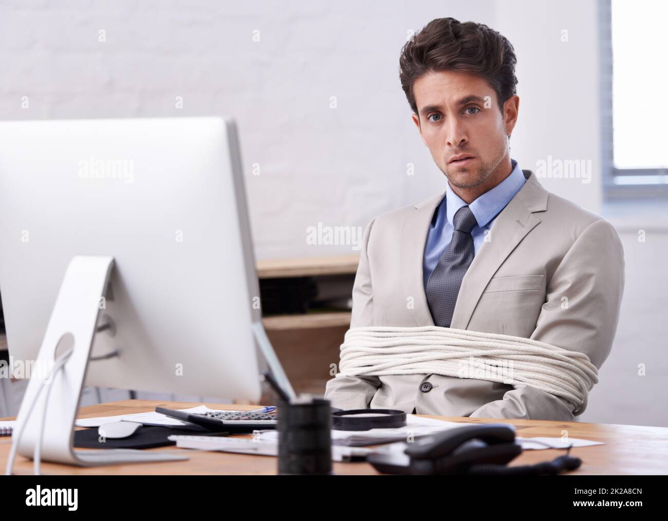Tied to desk hires stock photography and images Alamy
