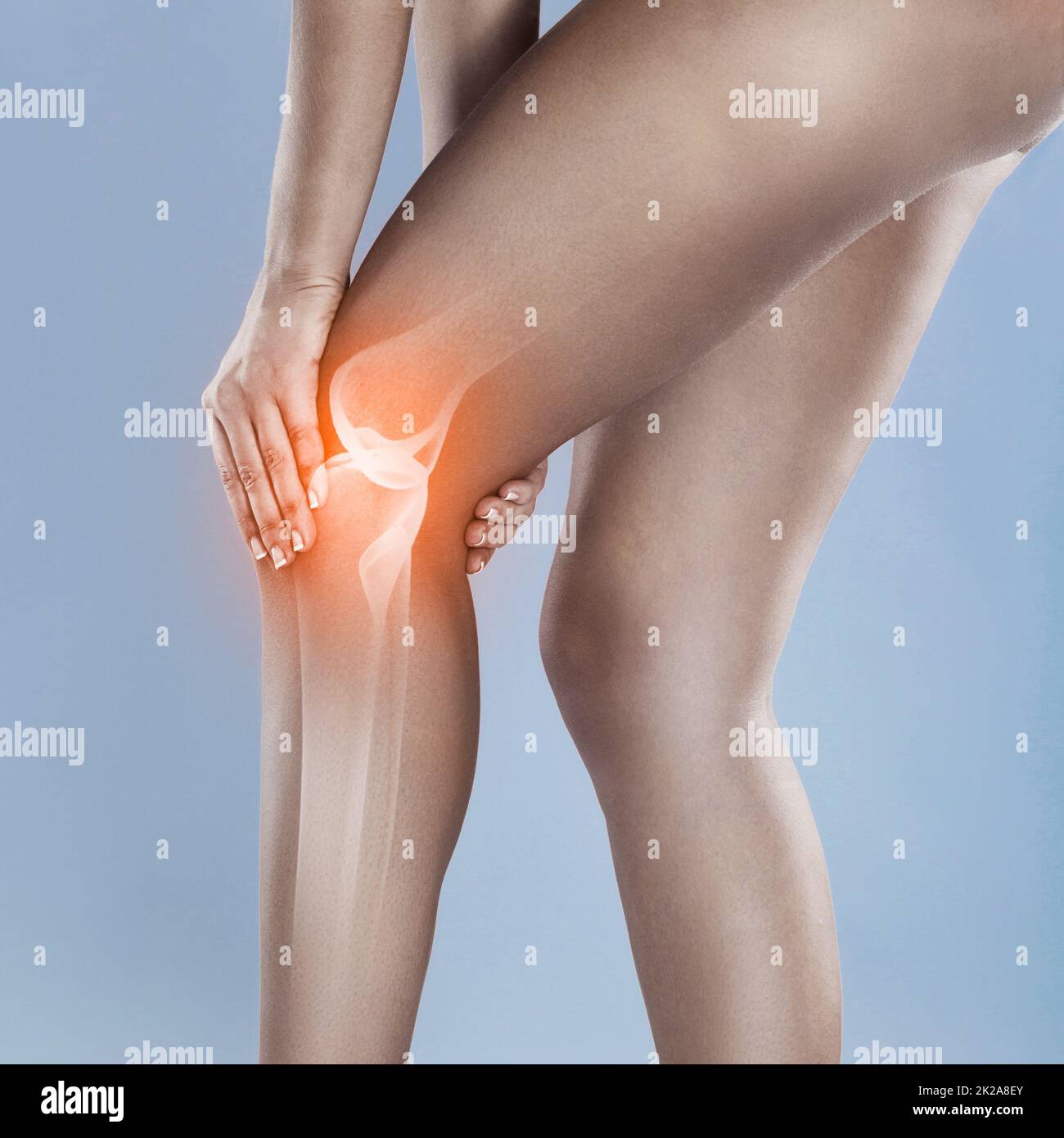 Knee injuries can linger. Concept shot of a woman with a painful knee joint. Stock Photo