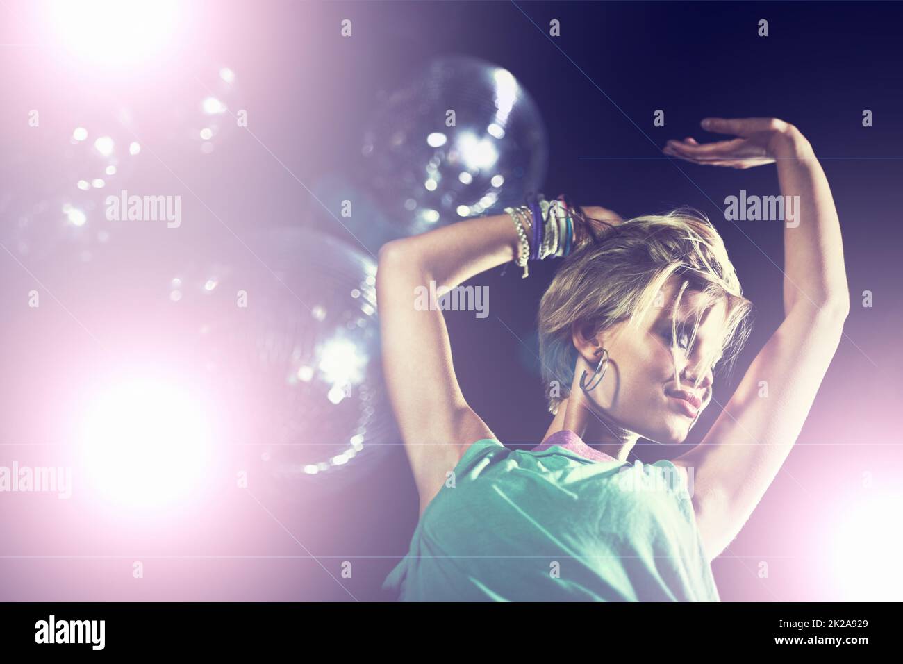 Partying the night away. Shot of an attractive and stylish young woman in a night club. Stock Photo
