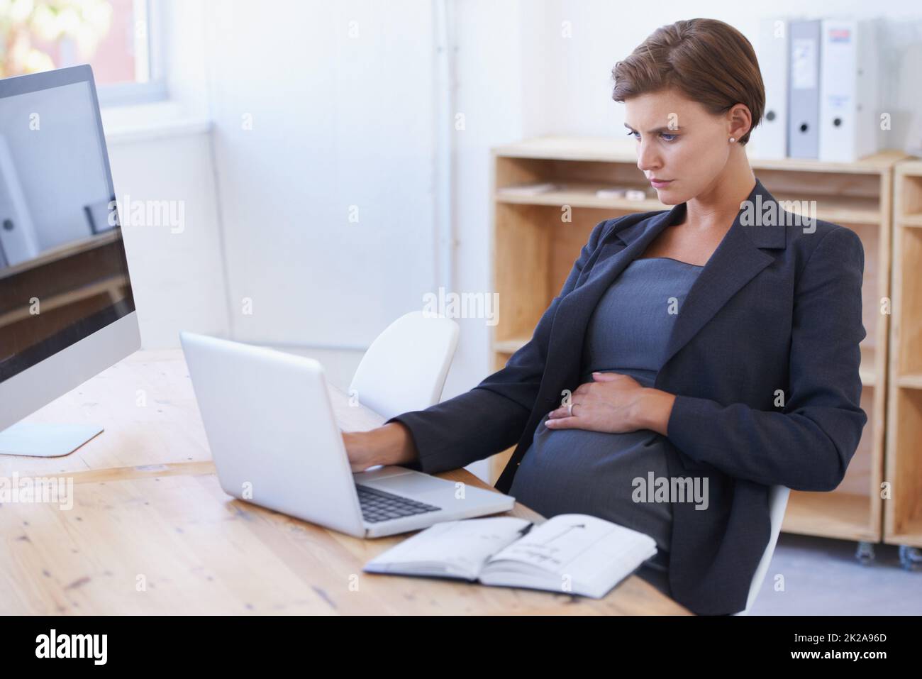 Pregnant office chair hi-res stock photography and images - Page 2 - Alamy