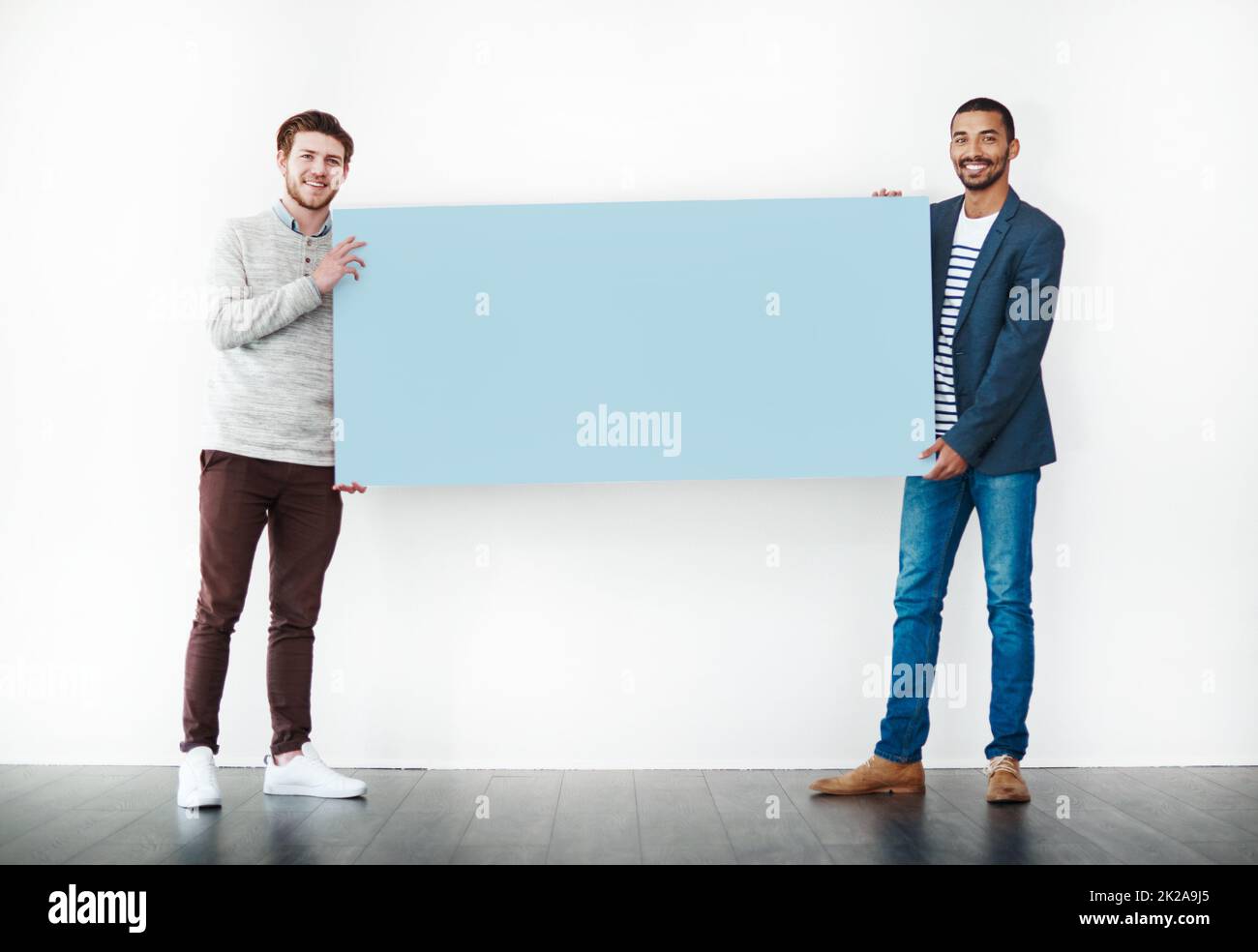 Two men standing full length hi-res stock photography and images - Alamy