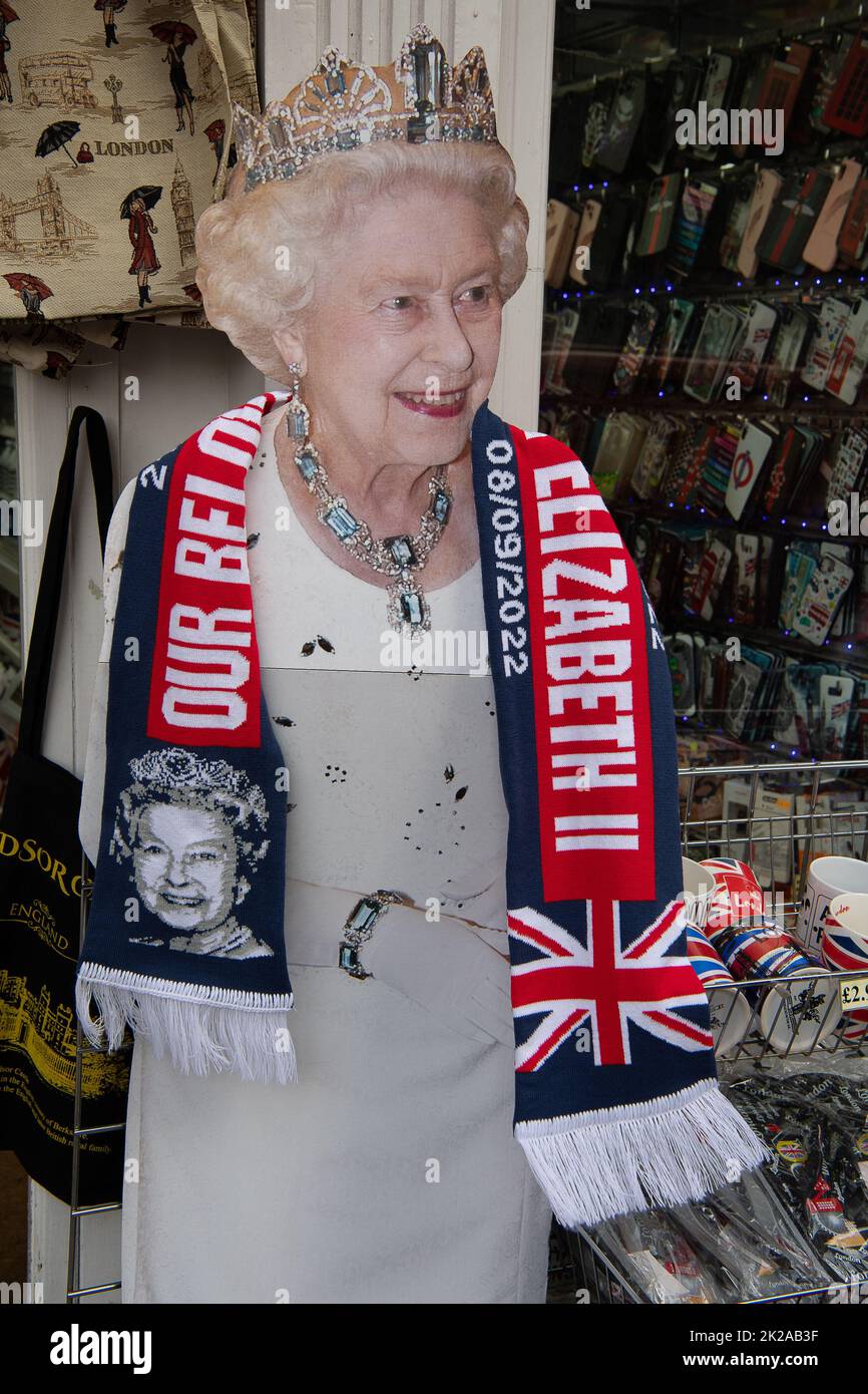 Windsor, Berkshire, UK. 22nd September, 2022. A scarf with the date of Her Majesty the Queen's death in the window of a tourist shop in Windsor. Credit: Maureen McLean/Alamy Live News Stock Photo