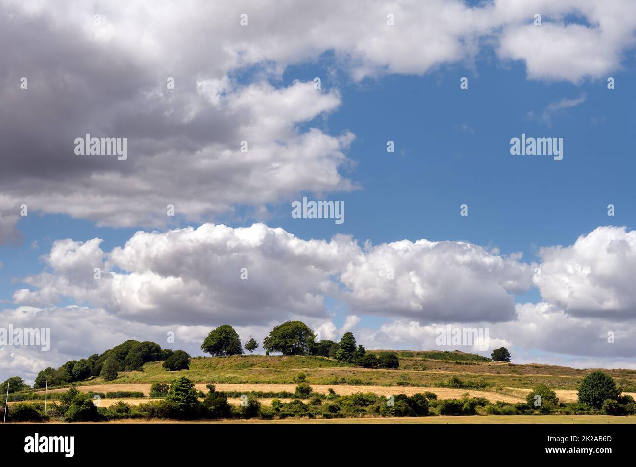 View of Old Sarum hill, the ruined site of the earliest settlement of Salisbury, in summer, Wiltshire, England Stock Photo