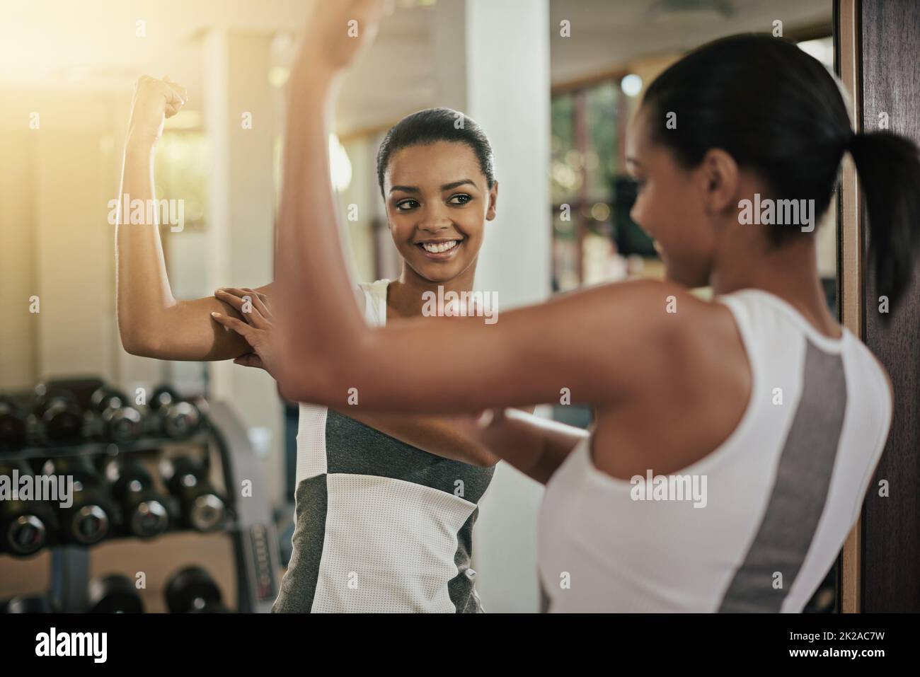 Black woman exercise workout gym mirror hi res stock photography