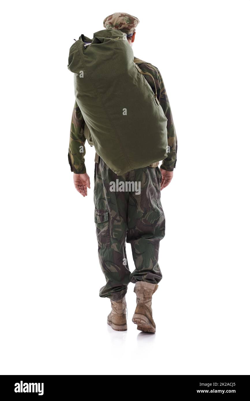 Reporting for duty. Shot of a young man in military fatigues. Stock Photo