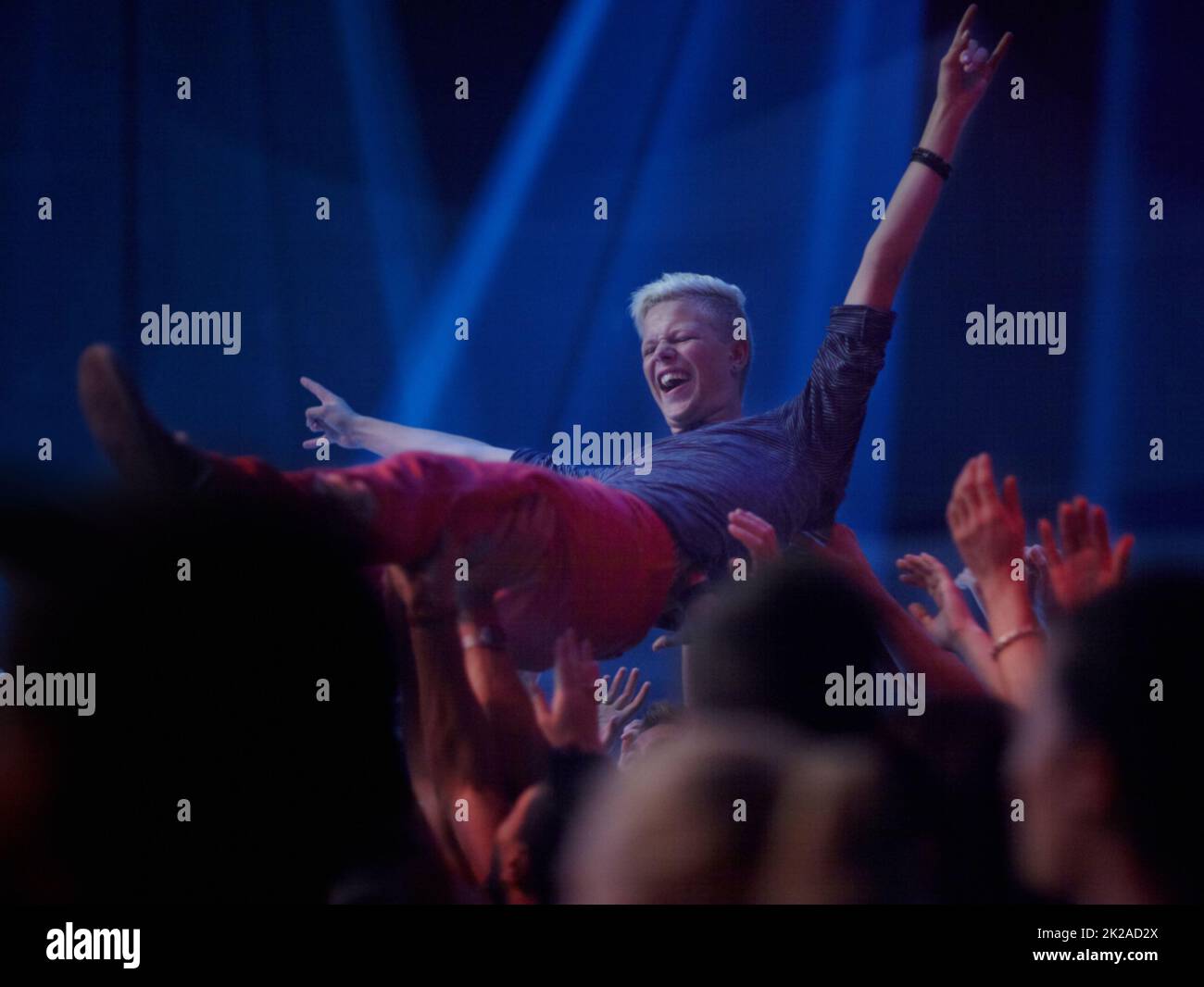 Woman at a rock concert hi-res stock photography and images - Alamy