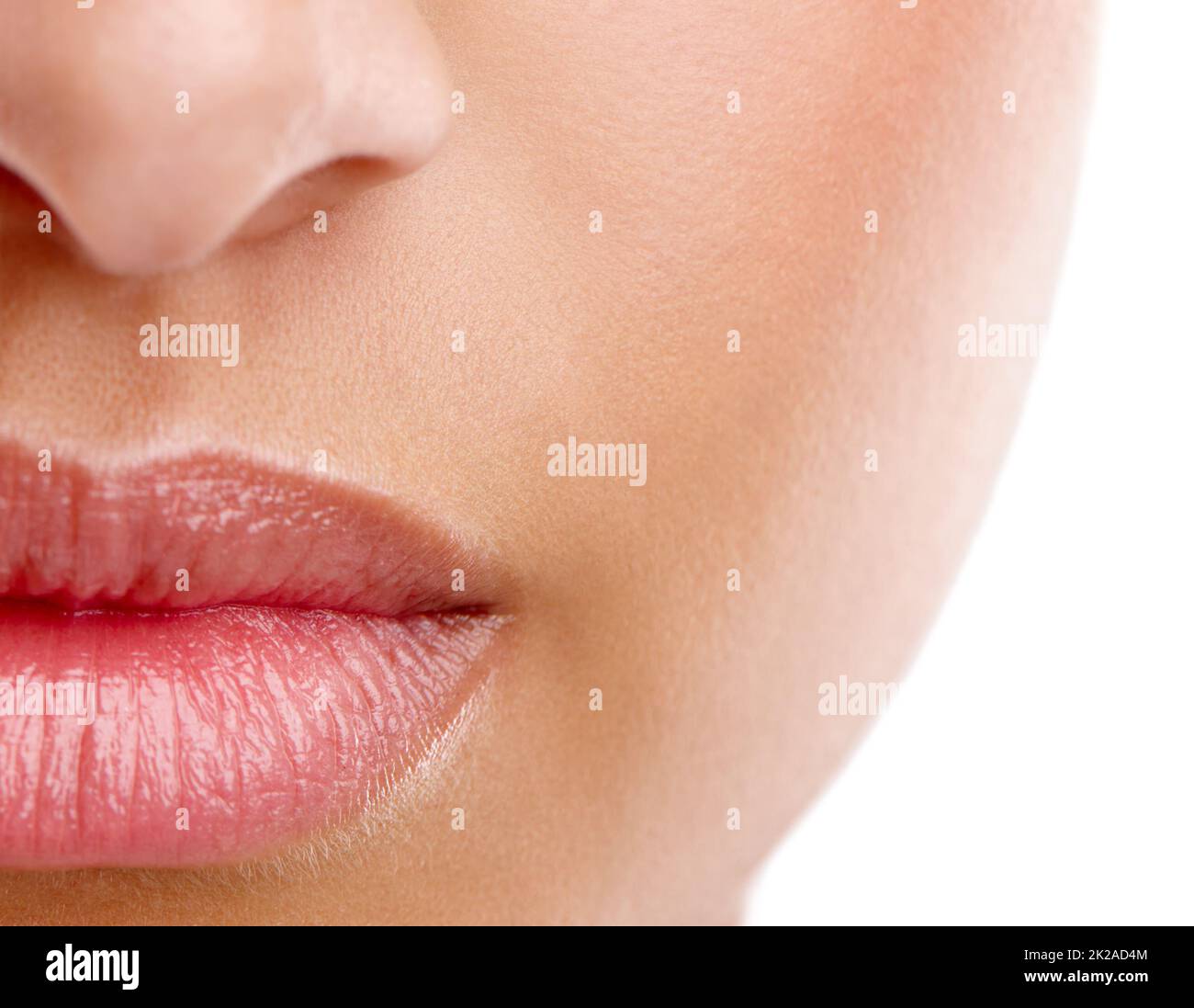 Now those are luscious lips. Closeup studio shot of a beautiful young womans mouth with lipstick applied. Stock Photo