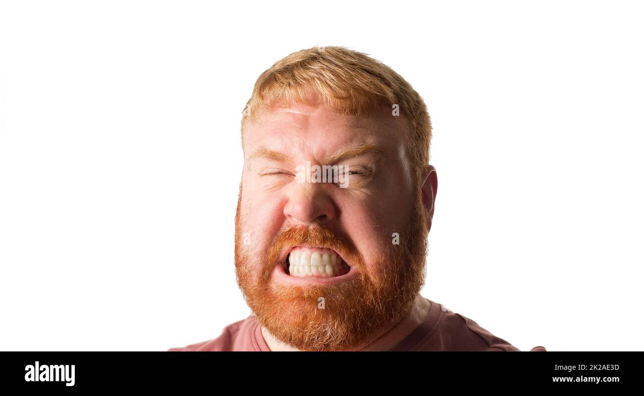 Man looking into camera with an angry expression. Stock Photo