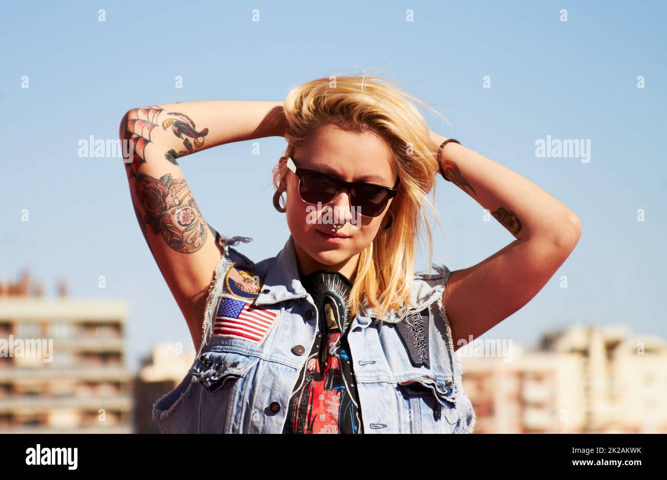 Capture my style. Shot of a young woman with tattoos. Stock Photo