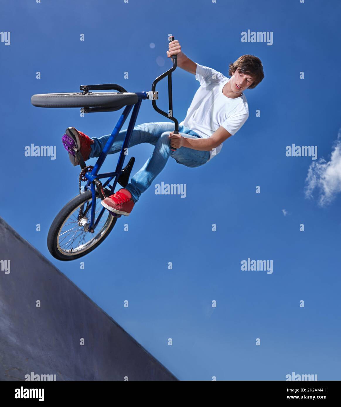 Practicing for the x games. Cropped shot of a teenage boy riding a bmx