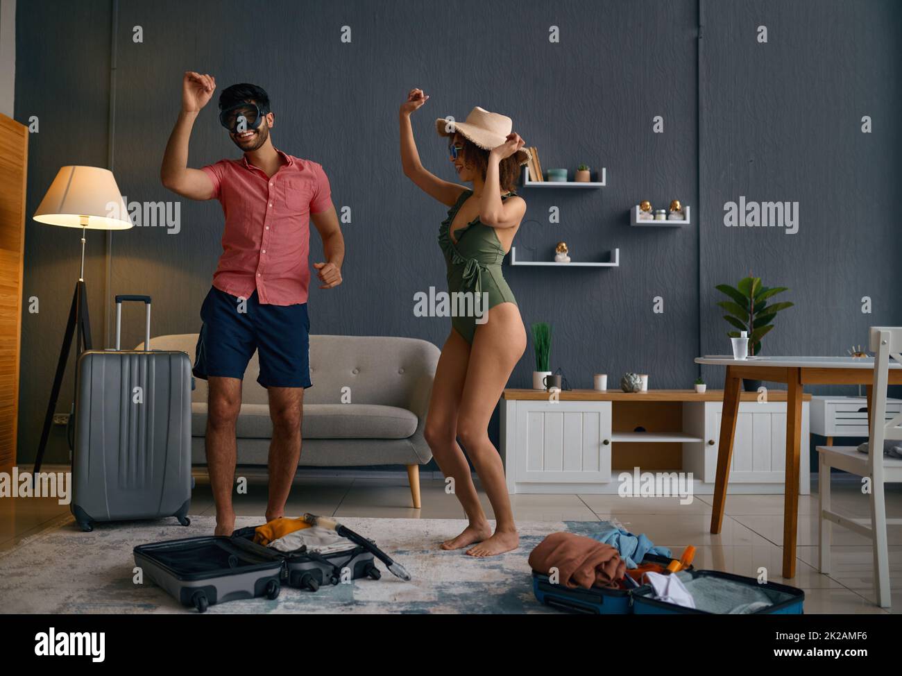 Couple having fun before going on resort Stock Photo