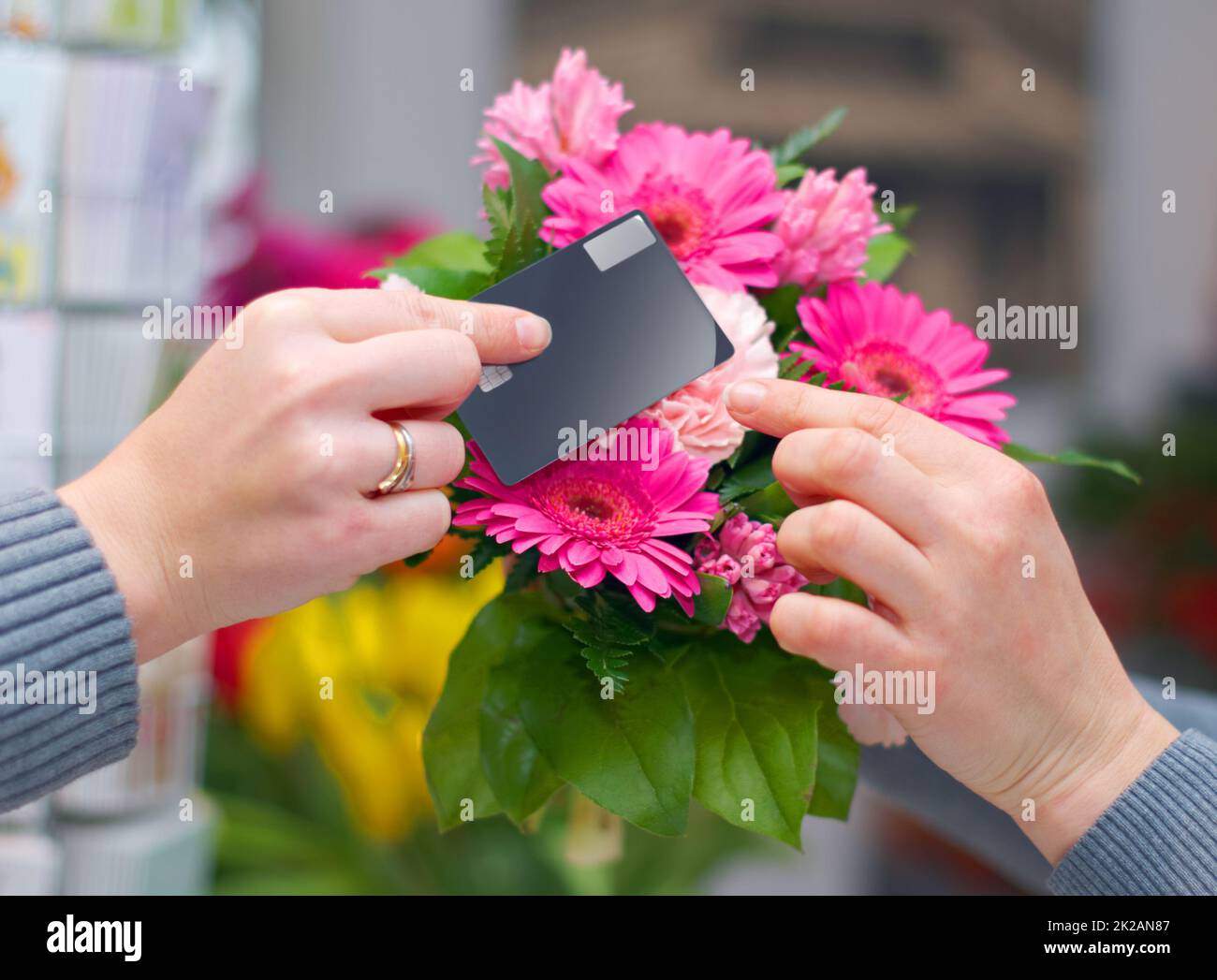 Proving that beauty can be bought. Cropped shot of a woman buying
