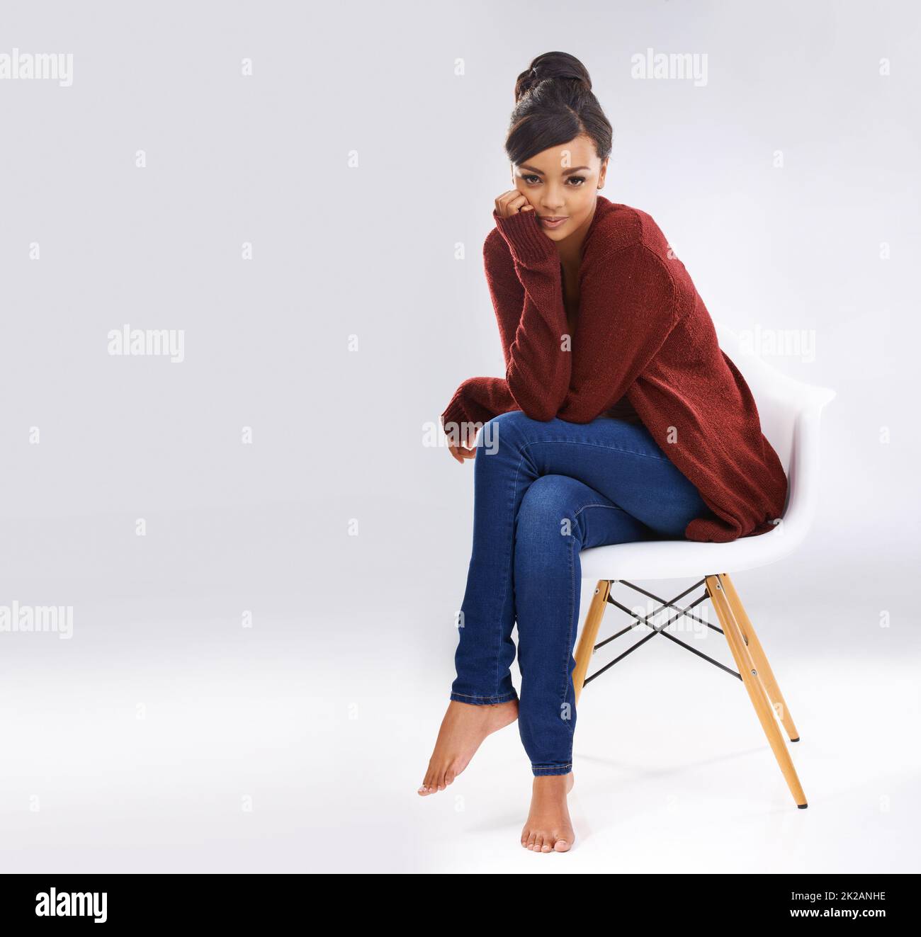 Woman sitting alone chair hi-res stock photography and images - Alamy