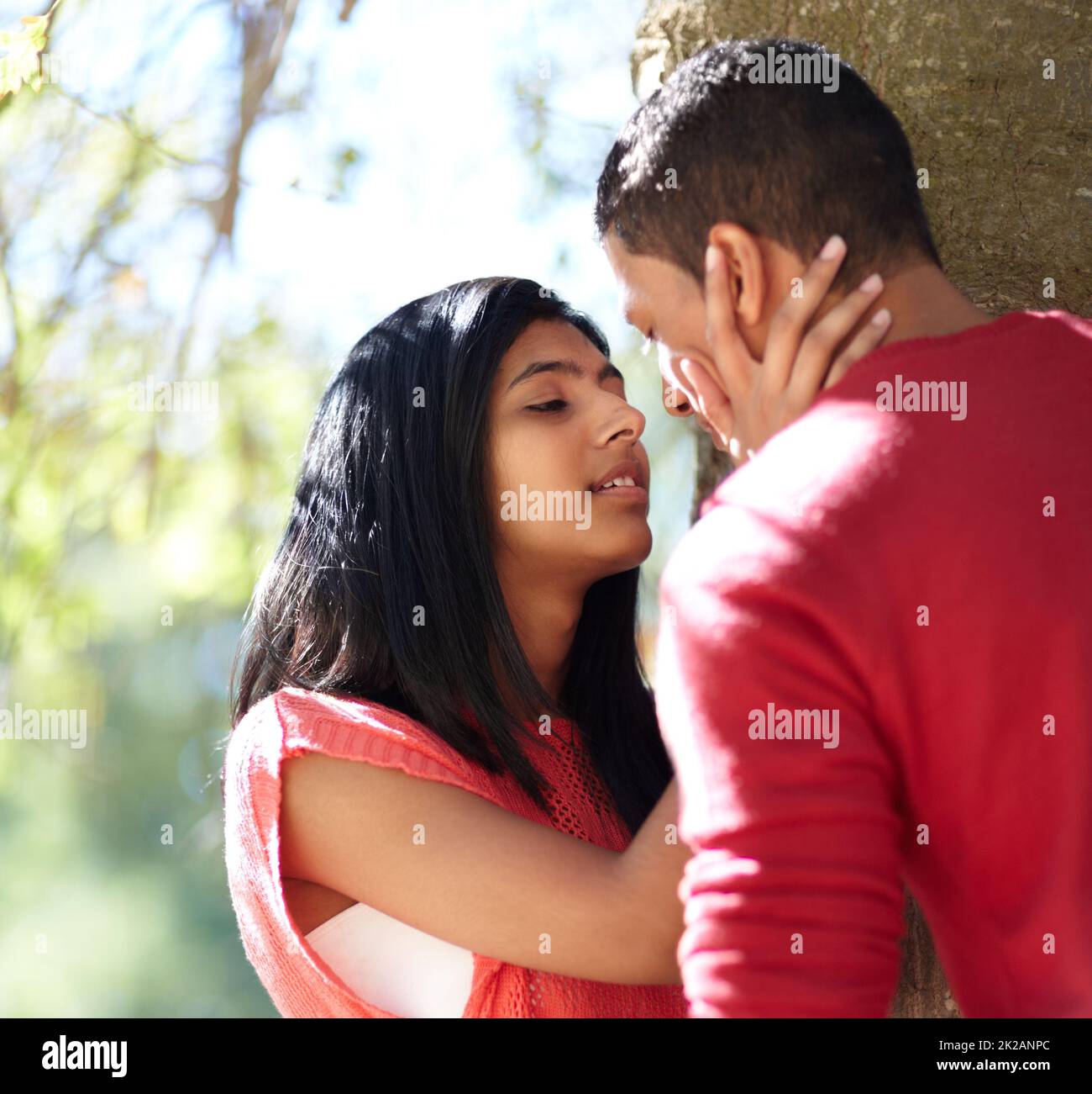 Young indian couple kissing hi-res stock photography and images - Alamy