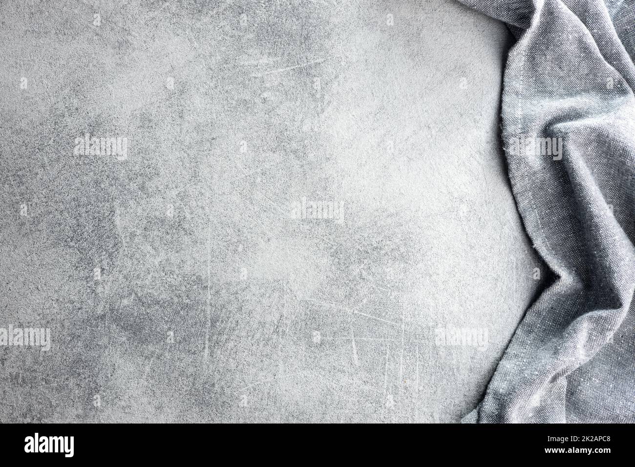 Kitchen table background with gray napkin. Stock Photo