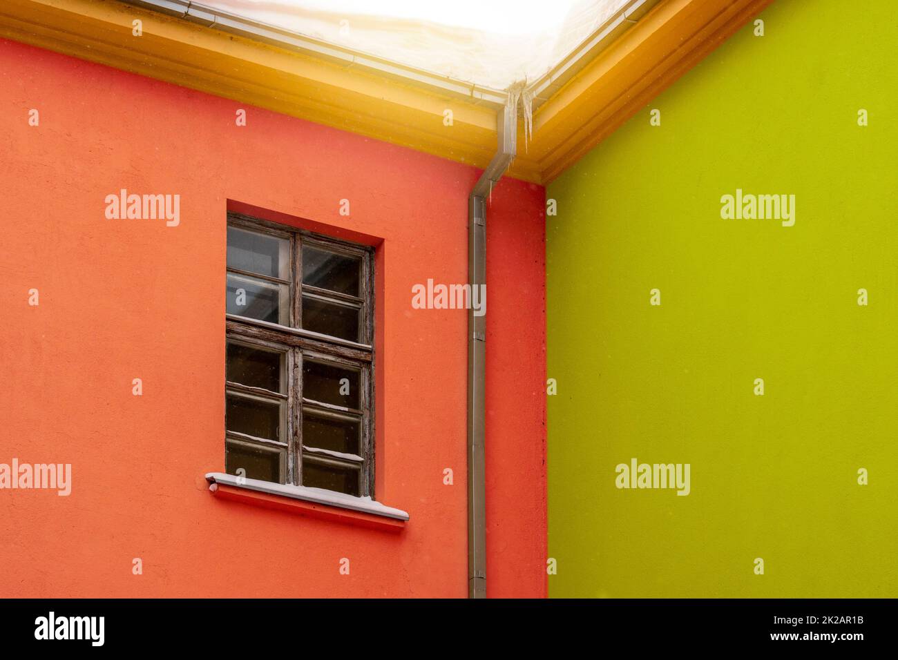 Building with colorful walls and old wooden window Stock Photo - Alamy