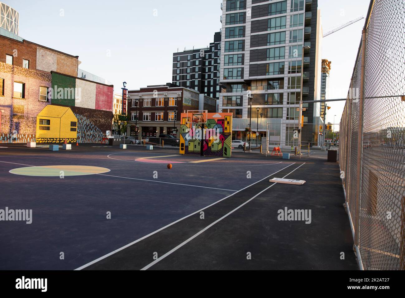 Painted murals on urban basketball court walls Stock Photo Alamy