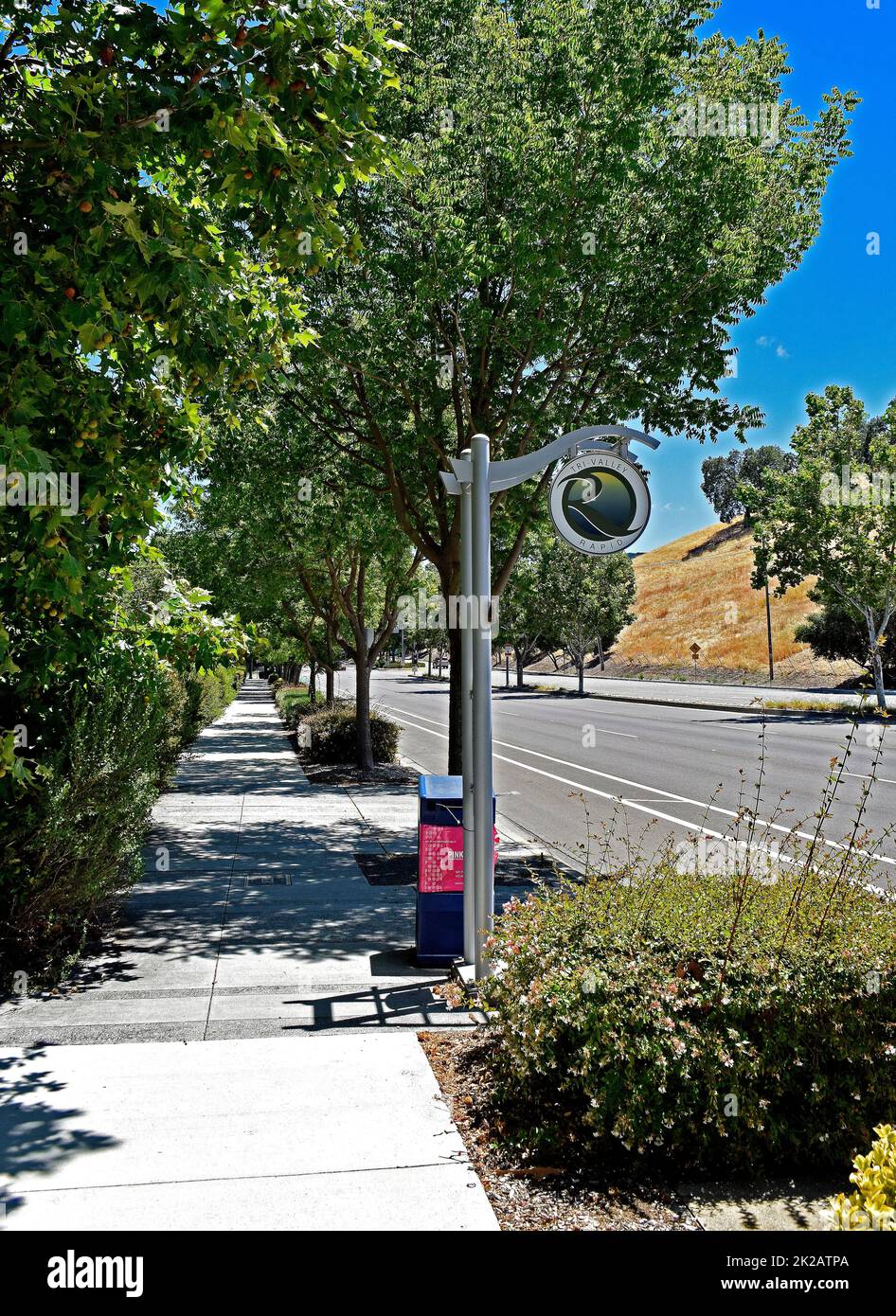 Tri-Valley Rapid Transit bus stop sign in Pleasanton, California, USA Stock Photo
