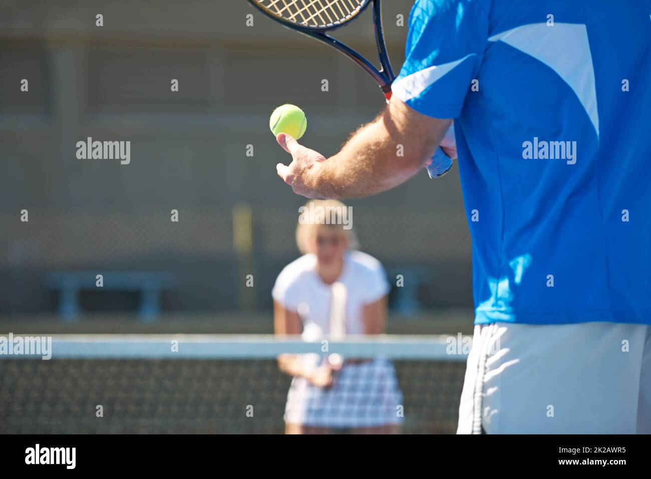 You ready for this. Cropped image of a man bouncing a tennis ball in