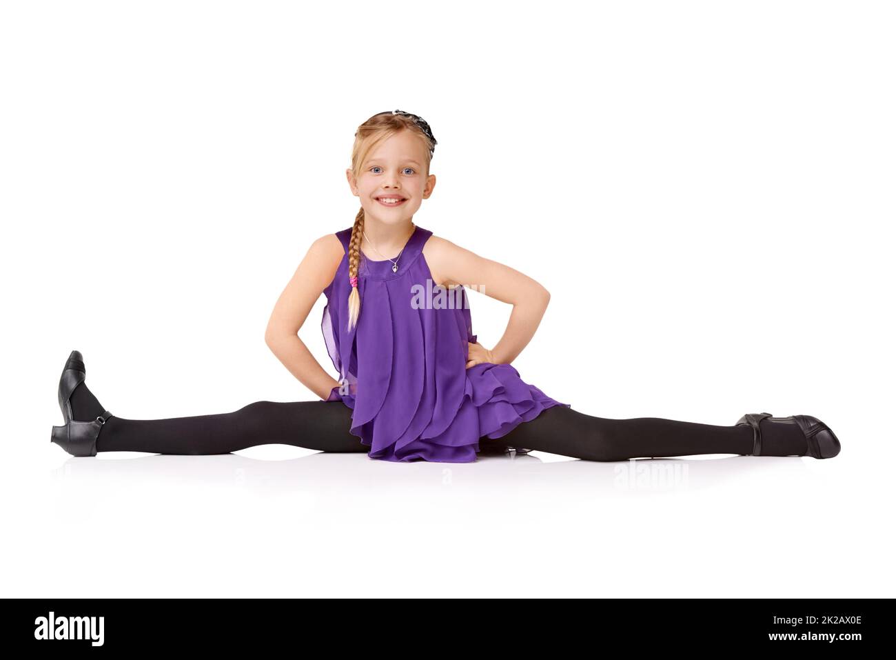 Cute little girl doing splits Cut Out Stock Images & Pictures - Alamy