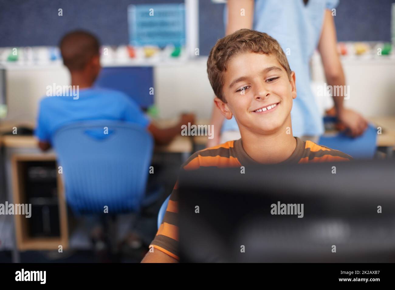 Young child and computer screen hi-res stock photography and images - Alamy