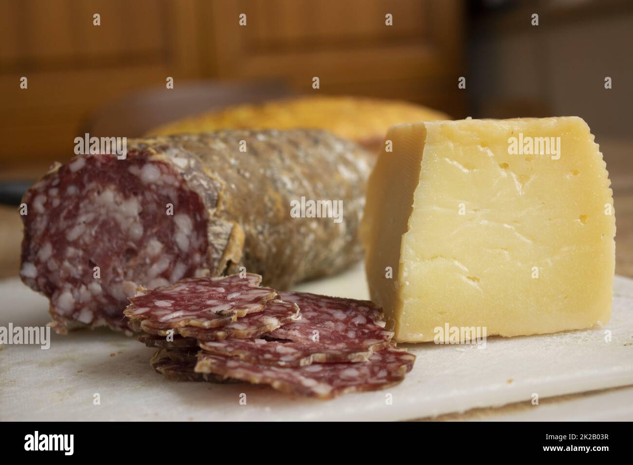 Milan salami and Sardinian pecorino Stock Photo