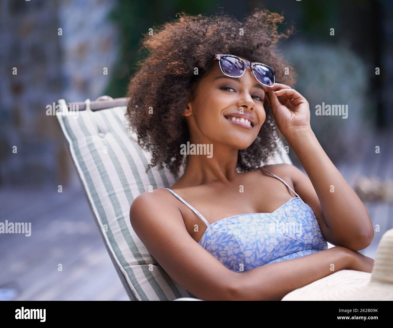 Woman relaxing in deck chair hi-res stock photography and images - Alamy