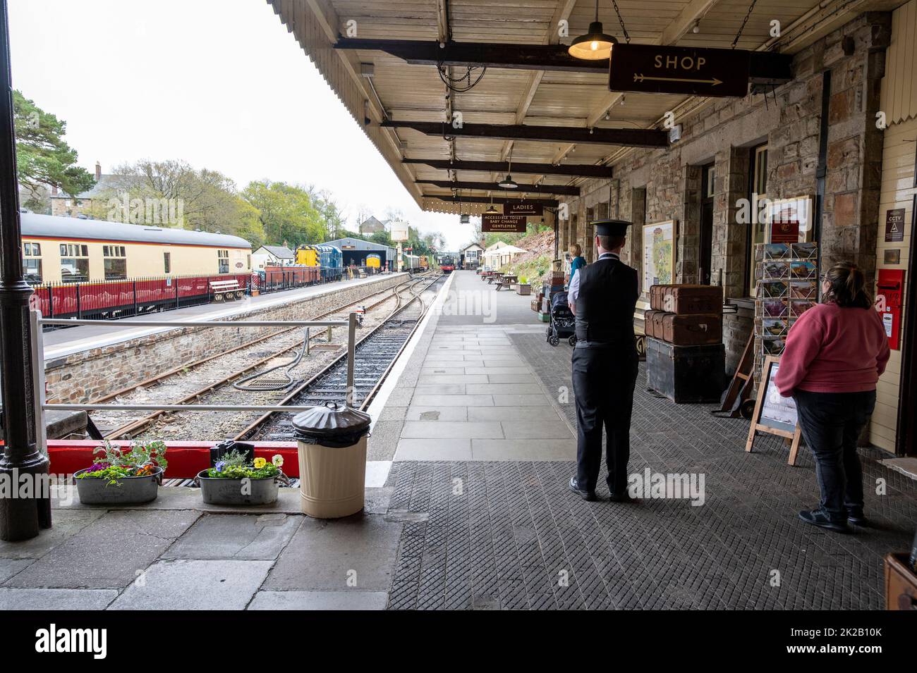 The Bodmin and Wenford heritage rail with stations and staff dressed for the period, organising steam train rides for the public. Cornwall, UK Stock Photo