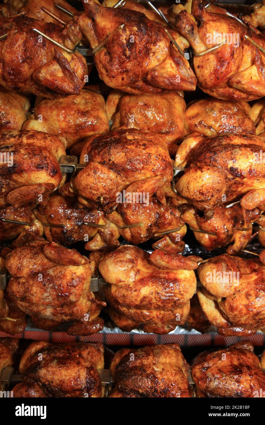 Chickens roasting in Rotisserie in Germany. Europe Stock Photo Alamy