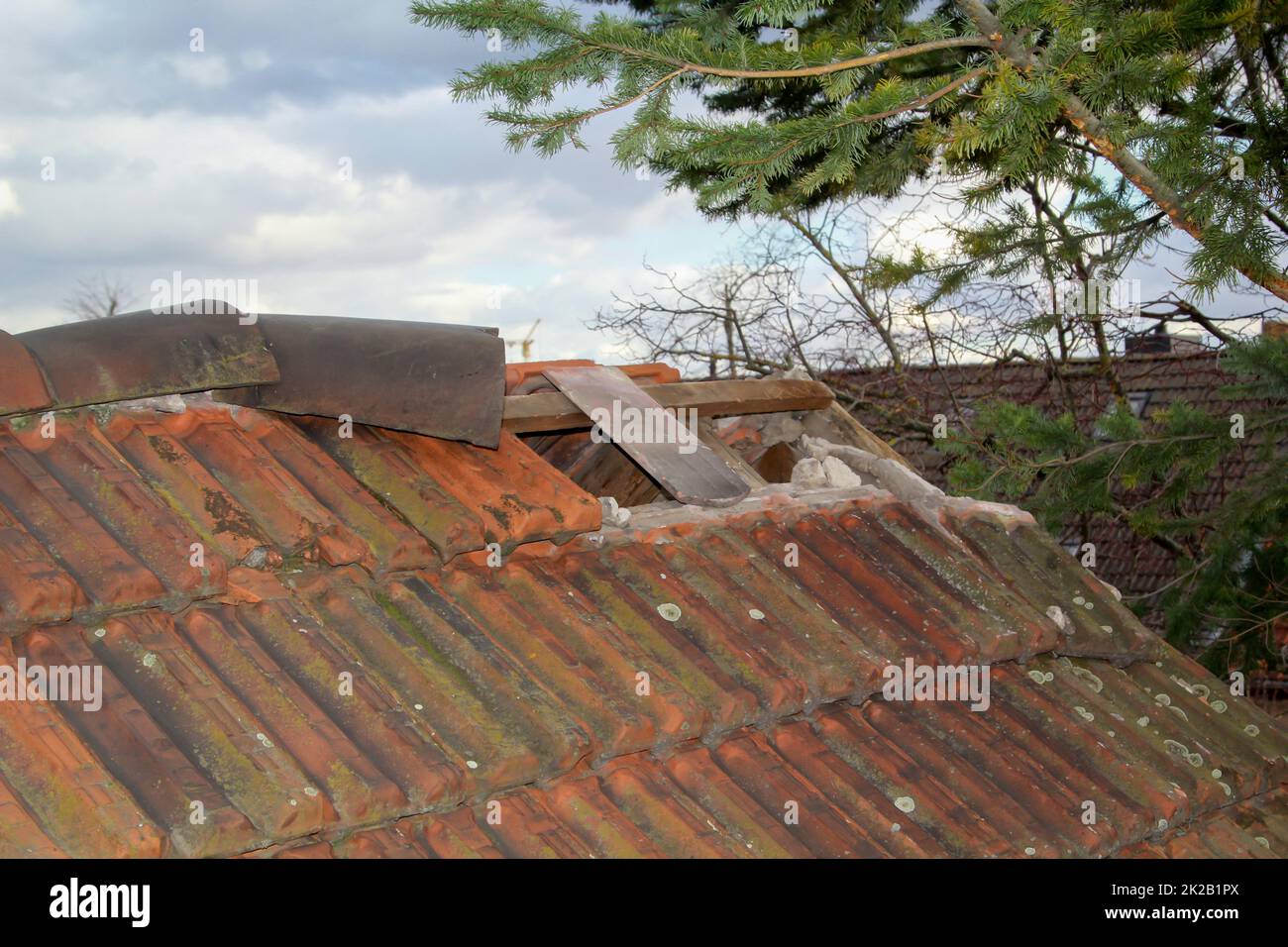 The damage to the roof after a strong storm, roof tiles are torn off