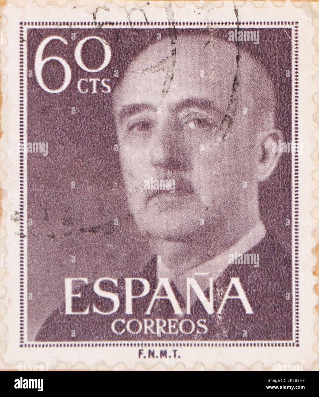 Photo of a brown 60 centimos Spanish postage stamp featuring an image