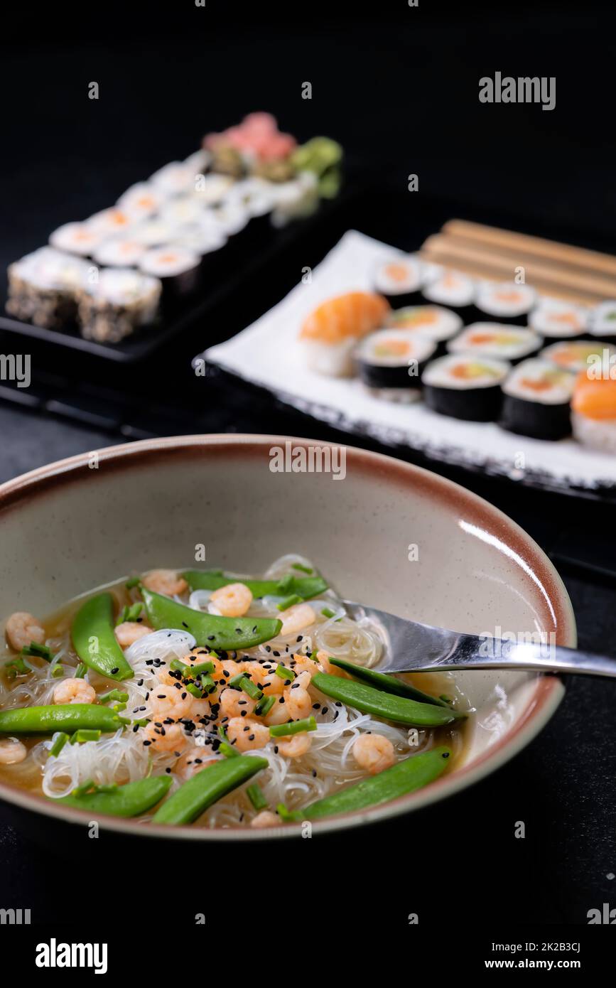 Various dishes of Asian cuisine with typical sushi Stock Photo