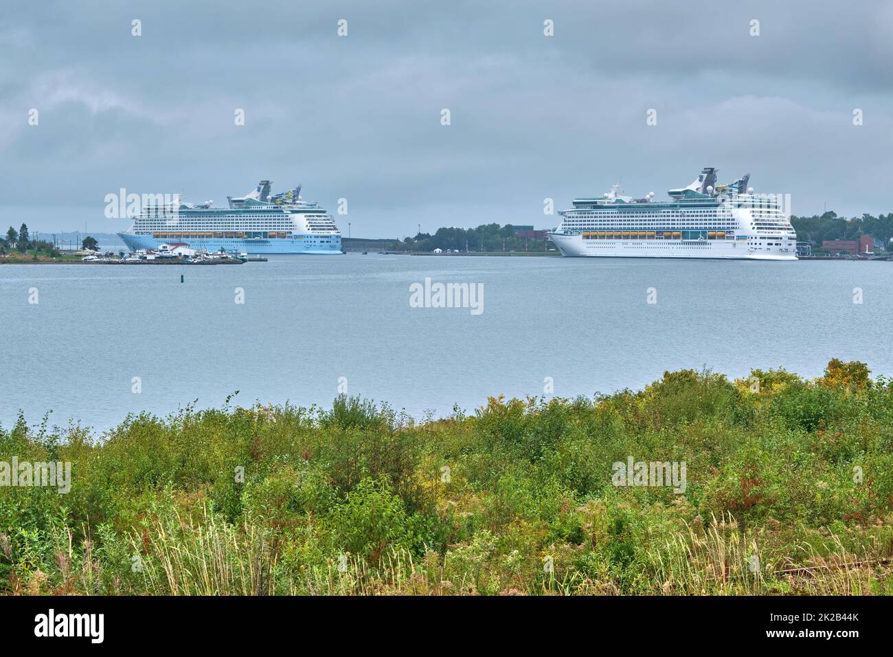 Two cruiseships safely moored in the harbour at Sydney Nova Scotia two days before Hurricane Fiona is expected to make landfall in Cape Breton. Stock Photo