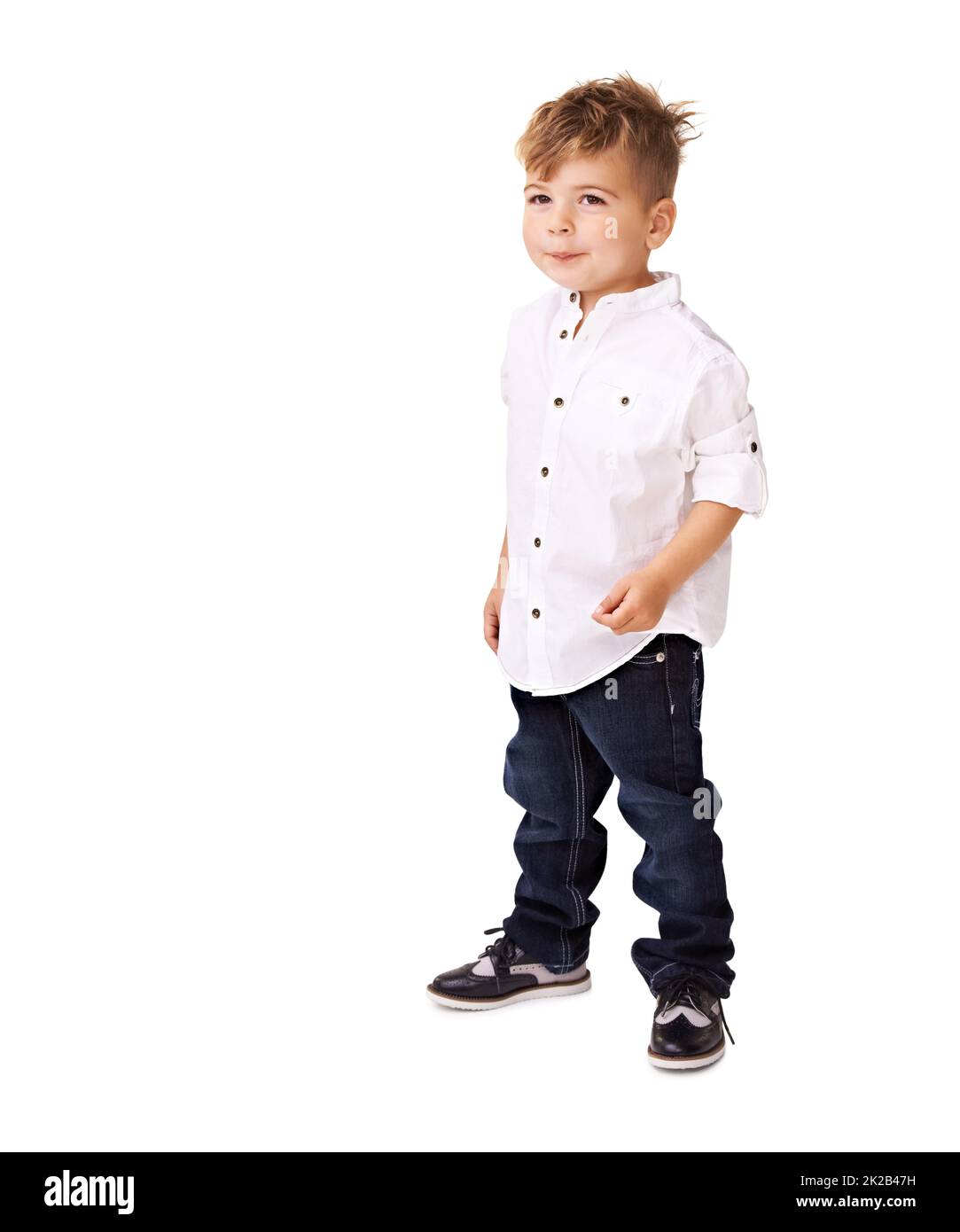 Trendy little man. A cute little boy posing on a white background. Stock Photo