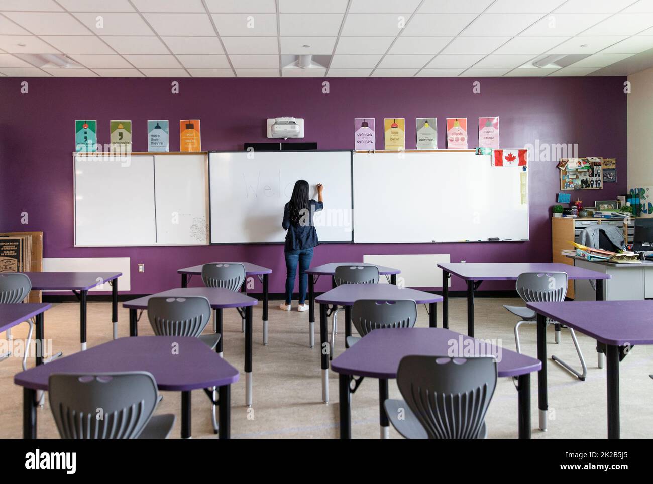 Portrait teacher writing on whiteboard hi-res stock photography and ...