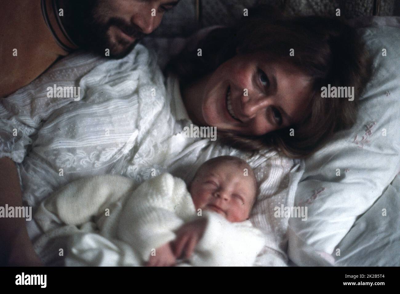 September 16, 1969 - British actress, VANESSA REDGRAVE proudly shows her newborn son, CARLO GABRIEL NERO, to the boys father, Italian actor FRANCO NERO, at her home in Chiswick, England. The parents are not married. (Credit Image: © Keystone Press Agency/ZUMA Press Wire) Stock Photo