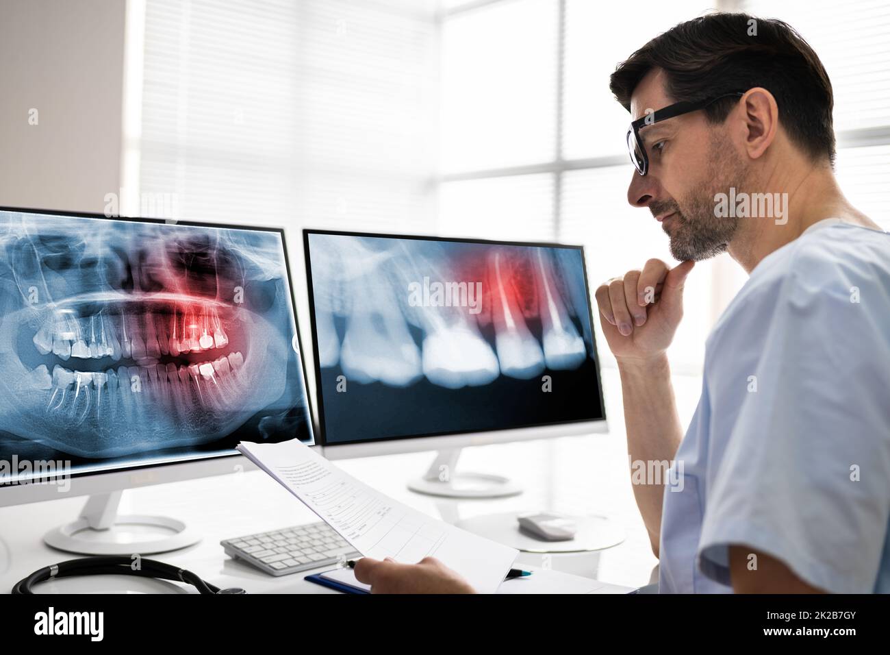 Radiologist Dentist Using X Ray Software Stock Photo
