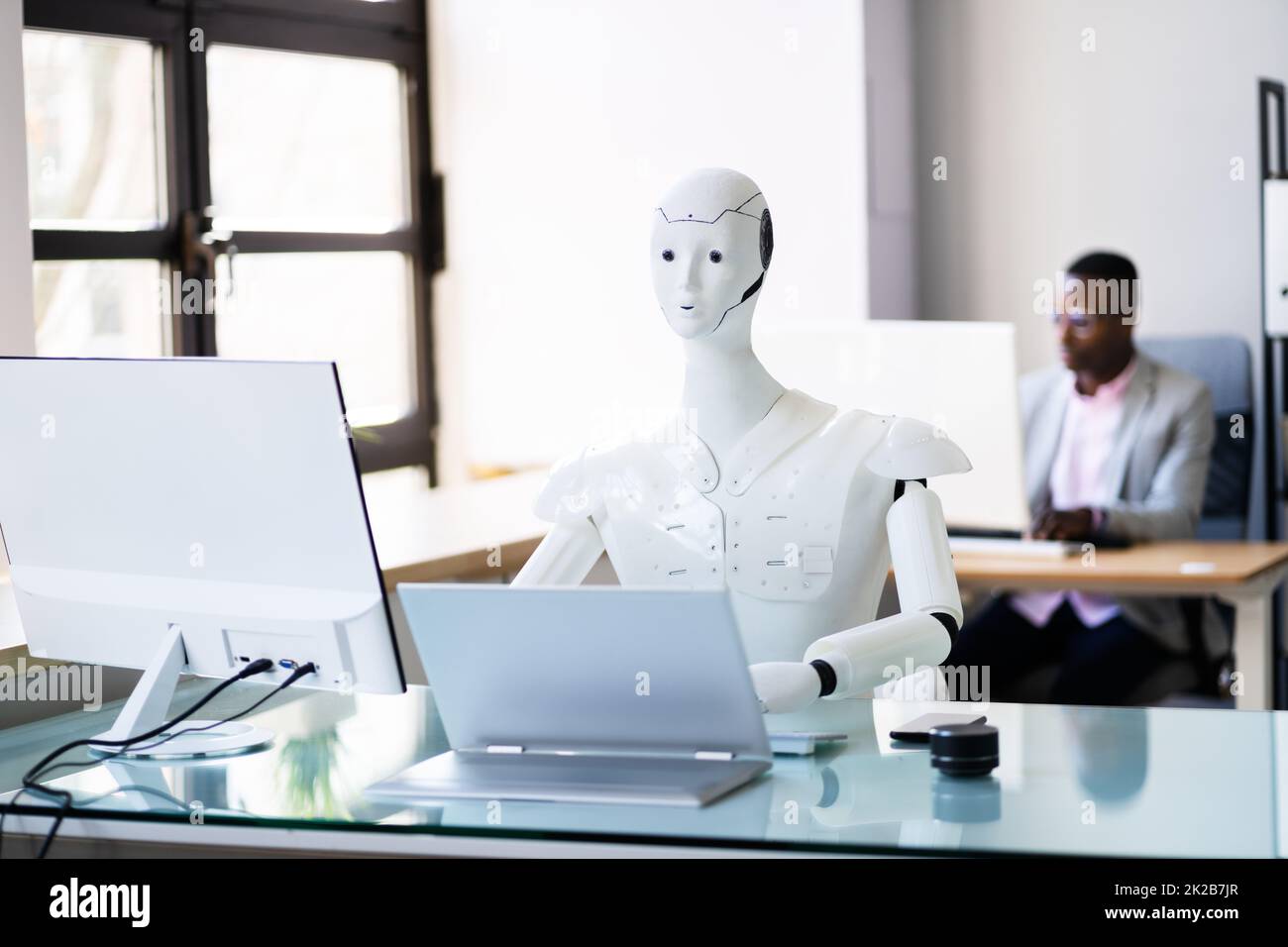 Artificial Intelligence Smart Robot Replacing Human Stock Photo