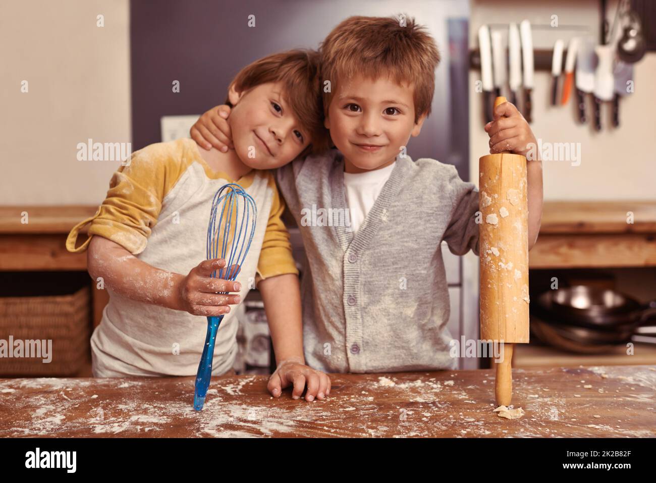We bake as a team. Cropped shot of two young brothers baking in the