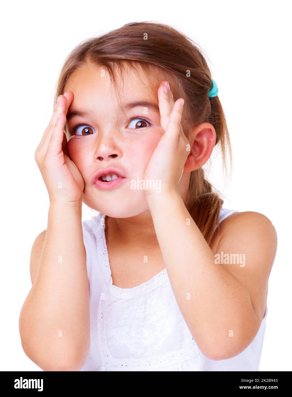 She cant believe it. Studio shot of a cute little girl pulling a face