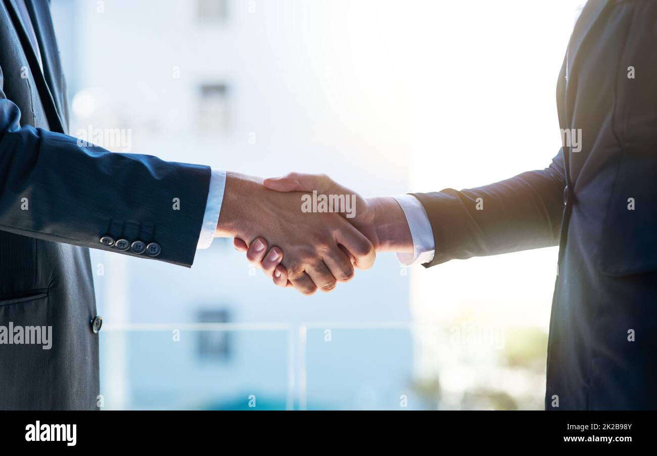 Business collaborations. Shot of two businesspeople shaking hands. Stock Photo