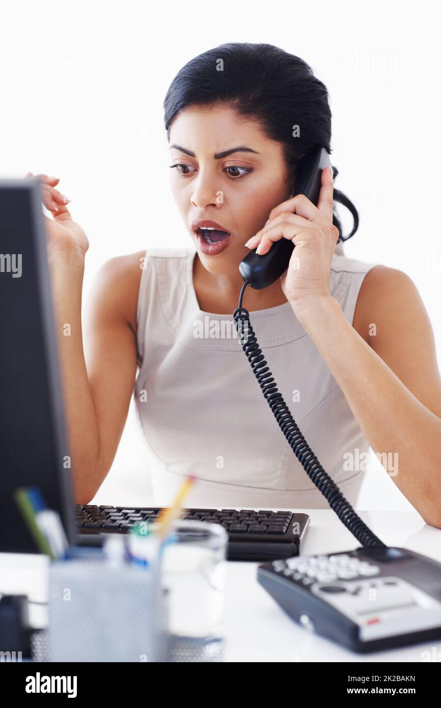 Shocked customer service representative. Attractive shocked female call