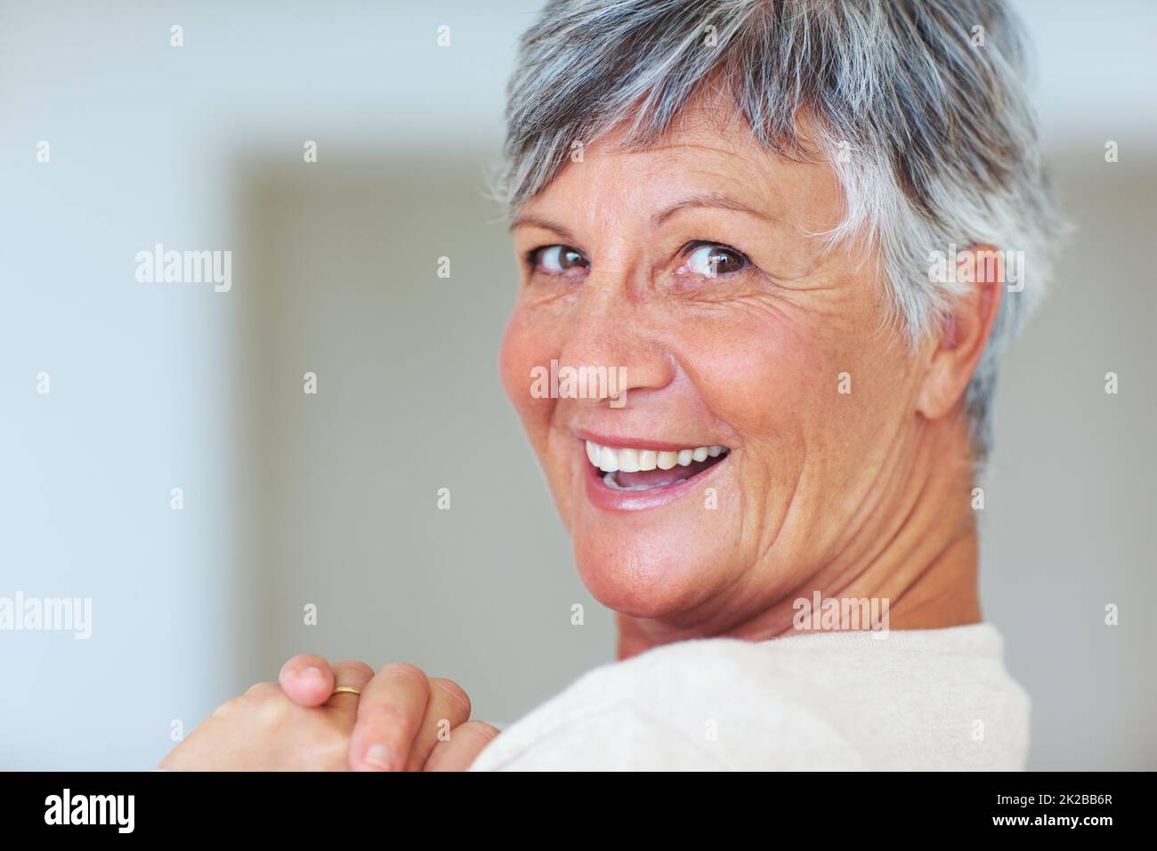 Mature woman smiling hi-res stock photography and images - Alamy