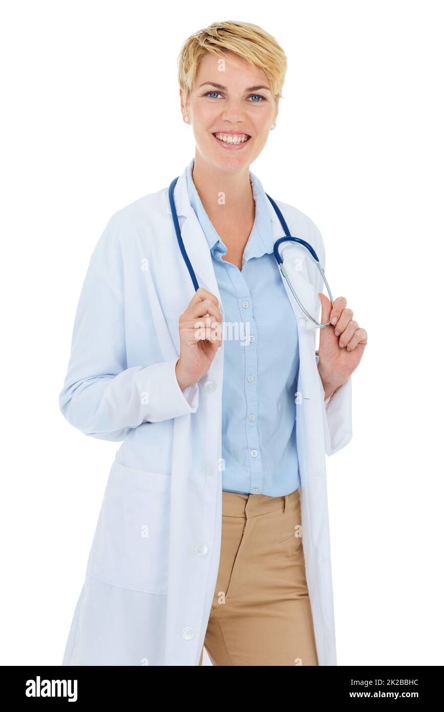 Your illness is her concern. A young female doctor standing against a white background. Stock Photo