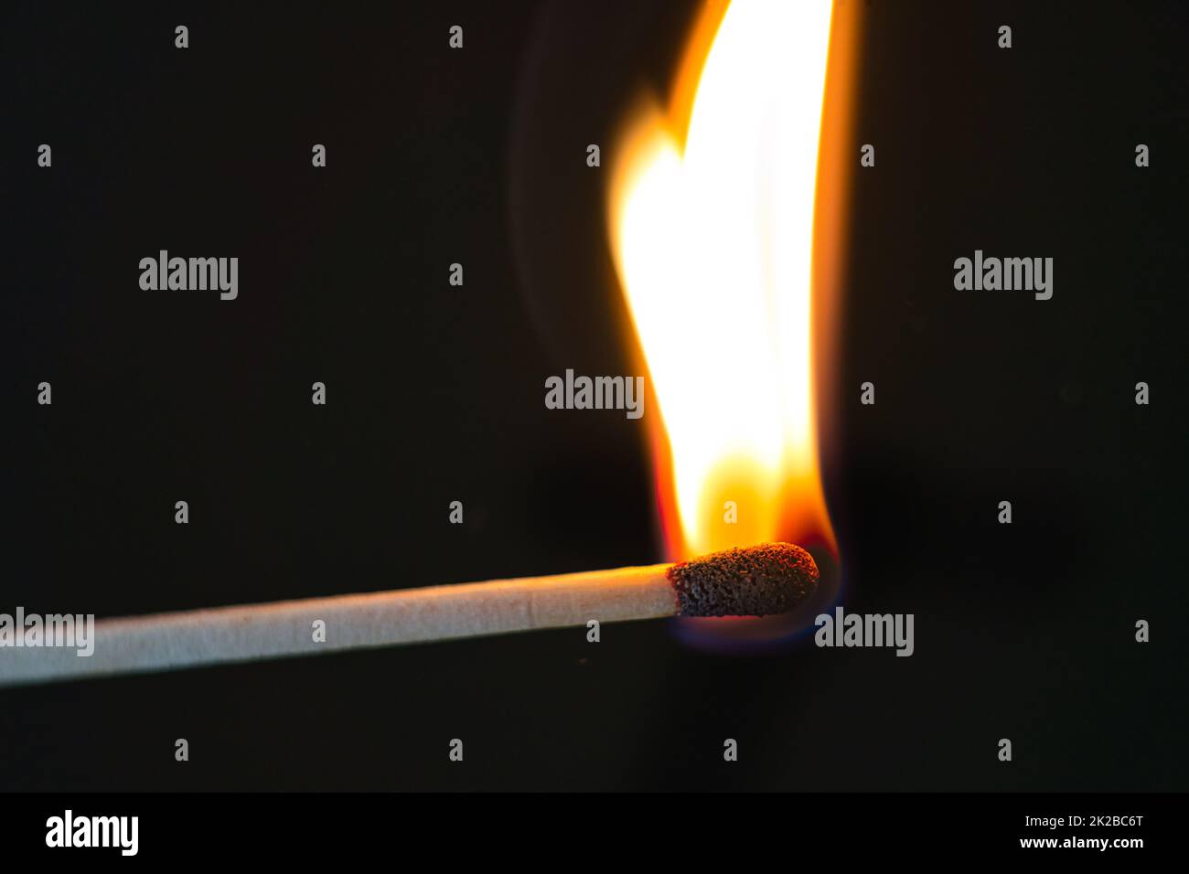 match is burning hot on black Stock Photo